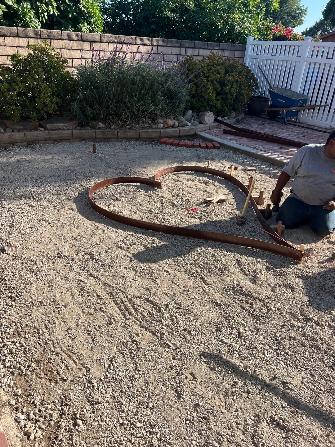 picture of a handyman doing landscaping in a residential home